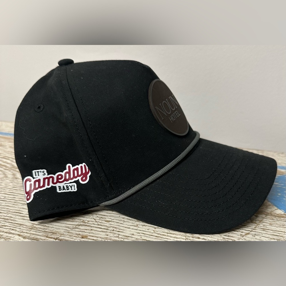 Stylish Black Cap with Embroidered Patch on the front.